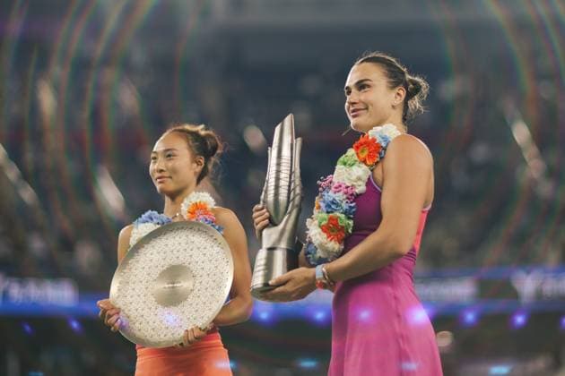 WUHAN, CHINA - OCTOBER 13: Champion Aryna Sabalenka (R) and runner-up Zheng Qinwen of China pose with their trophies during the awarding ceremony after the Women s Singles Final match on day nine of 2024 Wuhan Open at Optics Valley International Tennis Center on October 13, 2024 in Wuhan, Hubei Province of China.  Copyright: xVCGx 111523558278