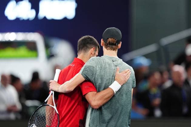 (241013) -- SHANGHAI, Oct. 13, 2024 -- Novak Djokovic (L) hugs Jannik Sinner after the men s singles final match between Jannik Sinner of Italy and Novak Djokovic of Serbia at the ATP, Tennis Herren World Tour Shanghai Masters tennis tournament in Shanghai, east China, Oct. 13, 2024. ) (SP)CHINA-SHANGHAI-TENNIS-ATP TOUR-SHANGHAI MASTERS(CN) XuxYanan 