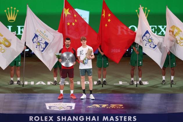(241013) -- SHANGHAI, Oct. 13, 2024 -- Novak Djokovic (L) and Jannik Sinner pose for photo during the awarding ceremony of the men s singles final match between Jannik Sinner of Italy and Novak Djokovic of Serbia at the ATP, Tennis Herren World Tour Shanghai Masters tennis tournament in Shanghai, east China, Oct. 13, 2024. ) (SP)CHINA-SHANGHAI-TENNIS-ATP TOUR-SHANGHAI MASTERS(CN) WangxXiang 