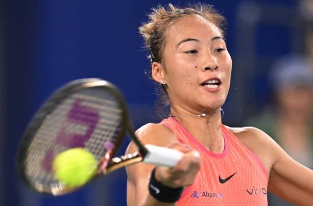 (241013) -- WUHAN, Oct. 13, 2024 -- Zheng Qinwen hits a return during the women s singles final match between Zheng Qinwen of China and Aryna Sabalenka of Belarus at the 2024 Wuhan Open tennis tournament in Wuhan, central China s Hubei Province, Oct. 13, 2024. ) (SP)CHINA-WUHAN-TENNIS-WUHAN OPEN-WOMEN S SINGLES-FINAL(CN) ChengxMin 