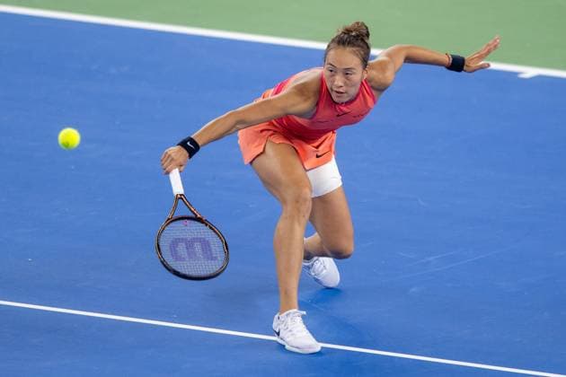 (241013) -- WUHAN, Oct. 13, 2024 -- Zheng Qinwen hits a return during the women s singles final match between Zheng Qinwen of China and Aryna Sabalenka of Belarus at the 2024 Wuhan Open tennis tournament in Wuhan, central China s Hubei Province, Oct. 13, 2024. ) (SP)CHINA-WUHAN-TENNIS-WUHAN OPEN-WOMEN S SINGLES-FINAL(CN) XiaoxYijiu 