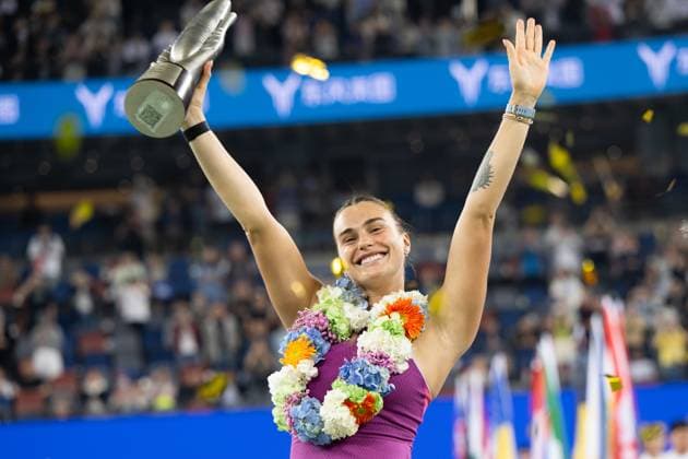 (241013) -- WUHAN, Oct. 13, 2024 -- Aryna Sabalenka celebrates during the awarding ceremony of women s singles final match between Zheng Qinwen of China and Aryna Sabalenka of Belarus at the 2024 Wuhan Open tennis tournament in Wuhan, central China s Hubei Province, Oct. 13, 2024. ) (SP)CHINA-WUHAN-TENNIS-WUHAN OPEN-WOMEN S SINGLES-FINAL(CN) XiaoxYijiu 