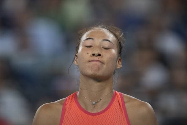 (241013) -- WUHAN, Oct. 13, 2024 -- Zheng Qinwen reacts during the women s singles final match between Zheng Qinwen of China and Aryna Sabalenka of Belarus at the 2024 Wuhan Open tennis tournament in Wuhan, central China s Hubei Province, Oct. 13, 2024. ) (SP)CHINA-WUHAN-TENNIS-WUHAN OPEN-WOMEN S SINGLES-FINAL(CN) XiaoxYijiu 