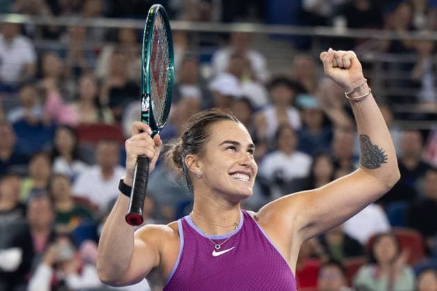(241013) -- WUHAN, Oct. 13, 2024 -- Aryna Sabalenka celebrates after the women s singles final match between Zheng Qinwen of China and Aryna Sabalenka of Belarus at the 2024 Wuhan Open tennis tournament in Wuhan, central China s Hubei Province, Oct. 13, 2024. ) (SP)CHINA-WUHAN-TENNIS-WUHAN OPEN-WOMEN S SINGLES-FINAL(CN) XiaoxYijiu 