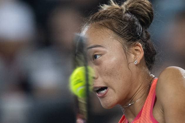 (241013) -- WUHAN, Oct. 13, 2024 -- Zheng Qinwen hits a return during the women s singles final match between Zheng Qinwen of China and Aryna Sabalenka of Belarus at the 2024 Wuhan Open tennis tournament in Wuhan, central China s Hubei Province, Oct. 13, 2024. ) (SP)CHINA-WUHAN-TENNIS-WUHAN OPEN-WOMEN S SINGLES-FINAL(CN) XiaoxYijiu 