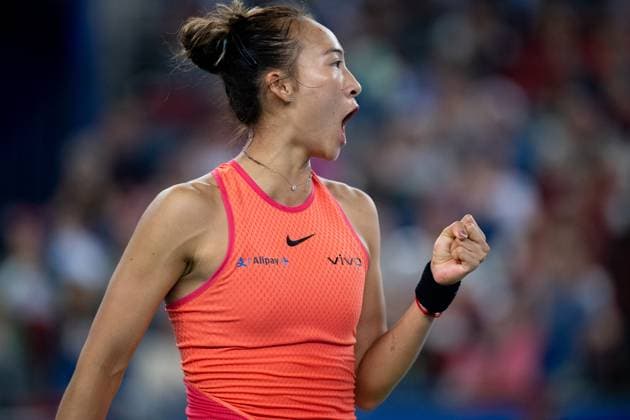 (241013) -- WUHAN, Oct. 13, 2024 -- Zheng Qinwen celebrates during the women s singles final match between Zheng Qinwen of China and Aryna Sabalenka of Belarus at the 2024 Wuhan Open tennis tournament in Wuhan, central China s Hubei Province, Oct. 13, 2024. ) (SP)CHINA-WUHAN-TENNIS-WUHAN OPEN-WOMEN S SINGLES-FINAL(CN) HuxJingwen 