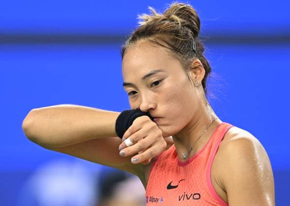 (241013) -- WUHAN, Oct. 13, 2024 -- Zheng Qinwen reacts during the women s singles final match between Zheng Qinwen of China and Aryna Sabalenka of Belarus at the 2024 Wuhan Open tennis tournament in Wuhan, central China s Hubei Province, Oct. 13, 2024. ) (SP)CHINA-WUHAN-TENNIS-WUHAN OPEN-WOMEN S SINGLES-FINAL(CN) ChengxMin 