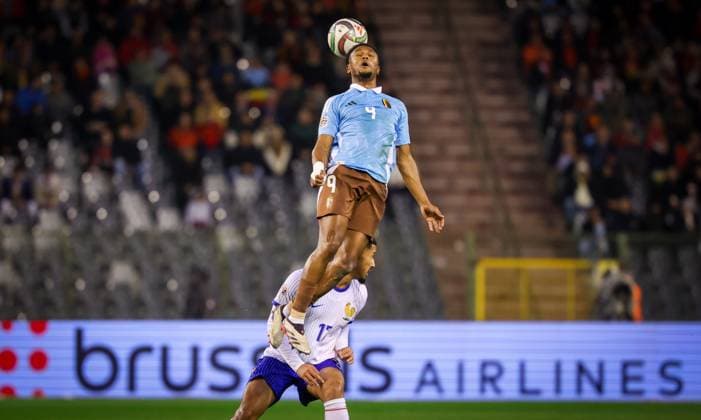 France s William Saliba and Belgium s Lois Openda fight for the ball during a soccer game between Belgian national soccer team Red Devils and France, match 4 (out of 6) in the League A Group 2 of the UEFA Nations League 2025 competition, Monday 14 October 2024 in Brussels. VIRGINIExLEFOUR  x102531151x