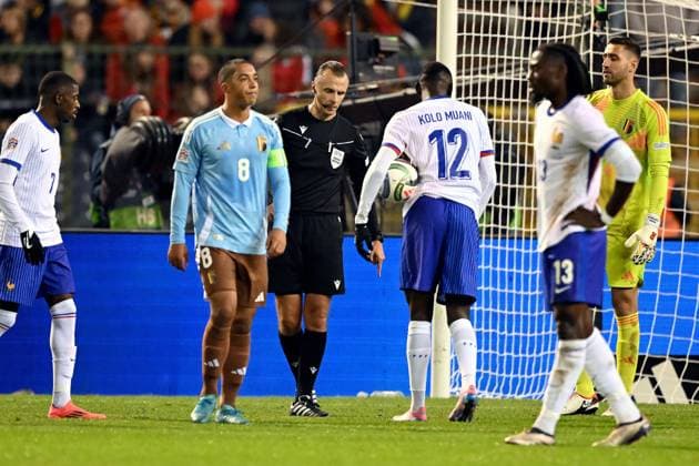 BRUSSELS - Referee Irfan Peljto, Randal Kolo Muani of France during the UEFA Nations League match between Belgium and France at the King Baudouin Stadium on Oct. 14, 2024 in Brussels, Belgium. ANP Hollandse Hoogte UEFA Nations League 2024 25 League A Group A2 2024 25 xVIxANPxSportx xGerritxvanxKeulenxIVx 510901903 originalFilename: 510901903.jpg