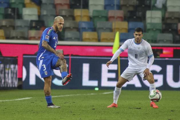 CALCIO - UEFA Nations League - Italy vs Israel Federico Dimarco of Italy competes for the ball with Liel Abada of Israel during Italy vs Israel, matchday 4 of League A of Uefa Nations League 2025, game at Bluenergy stadium - stadio Friuli in Udine (UD), Italy, on October 14, 2024. Udine Italy  Copyright: xIPAxSport ABACAx