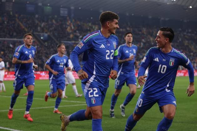 Udine, Italy, 14th October 2024. Giovanni Di Lorenzo of Italy celebrates with team mates after scoring to give the side a 2-0 lead during the UEFA Nations League match at Stadio Friuli, Udine. Picture credit should read: Jonathan Moscrop Sportimage EDITORIAL USE ONLY. No use with unauthorised audio, video, data, fixture lists, club league logos or live services. Online in-match use limited to 120 images, no video emulation. No use in betting, games or single club league player publications. SPI-3371-0023