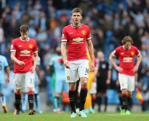 Soccer 2014: Manchester City vs Manchester Utd NOV 02 Nov. 2, 2014 - Manchester, United Kingdom - Michael Carrick of Manchester United, ManU dejected walks to thanks the fans - Barclays Premier League - Manchester City vs Manchester Utd - Etihad Stadium - Manchester - England - 2nd November 2014 - Picture David Klein Sportimage. Manchester United Kingdom EDITORIAL USE ONLY Copyright: xx ZUMA-20141102_zaf_si1_098.jpg DavidxKleinx csmphoto990180