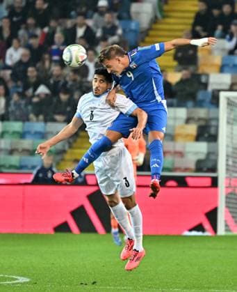 (241015) -- UDINE, Oct. 15, 2024 -- Mateo Retegui (R) of Italy vies against Matan Baltaxa of Israel during the UEFA Nations League 2024 25 League A Group A2 match between Italy and Israel in Udine, Italy, Oct. 14, 2024. (Photo by Xinhua) (SP)ITALY-UDINE-FOOTBALL-UEFA NATIONS LEAGUE A-ITALY VS ISRAEL DiegoxPetrussi 