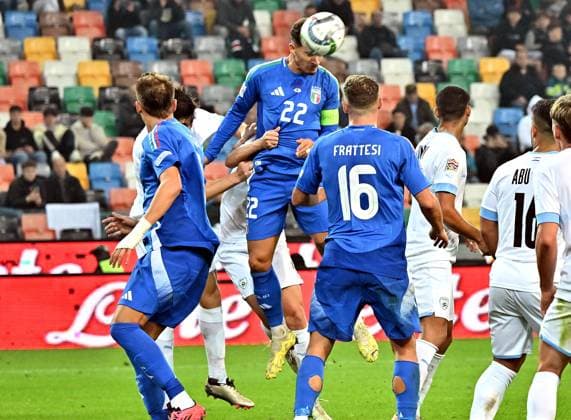 (241015) -- UDINE, Oct. 15, 2024 -- Giovanni Di Lorenzo (top) of Italy heads for the ball and scores during the UEFA Nations League 2024 25 League A Group A2 match between Italy and Israel in Udine, Italy, Oct. 14, 2024. (Photo by Xinhua) (SP)ITALY-UDINE-FOOTBALL-UEFA NATIONS LEAGUE A-ITALY VS ISRAEL DiegoxPetrussi 