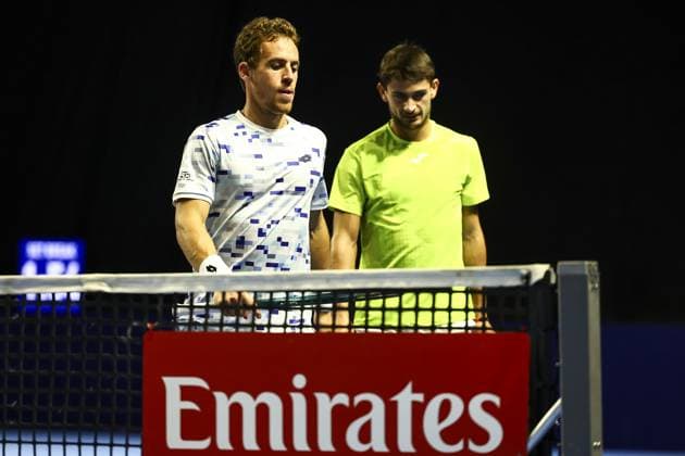 Spanish Roberto Carballes Baena and Mariano Navone pictured during a tennis match in the round of 16 of the doubles competition at the ATP, Tennis Herren European Open Tennis tournament in Antwerp, Tuesday 15 October 2024. DAVIDxPINTENS  x102629158x
