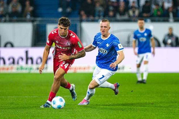 Julian Pauli 1 FC Koeln, 24 in duel with Isac Lidberg SV Darmstadt 98, 07 , GER, SV Darmstadt 98 vs 1 FC Koeln, Football, 2 Bundesliga, Matchday 9, Season 2024 2025, 18 10 2024 DFL REGULATIONS PROHIBIT ANY USE OF PHOTOGRAPHS as IMAGE SEQUENCES and or QUASI VIDEO GER, SV Darmstadt 98 vs 1 FC Koeln, Football, 2 Bundesliga, Matchday 9, Season 2024 2025, 18 10 2024 Darmsatdt Copyright: xEibner-Pressefoto FlorianxWieganx EP_FWD