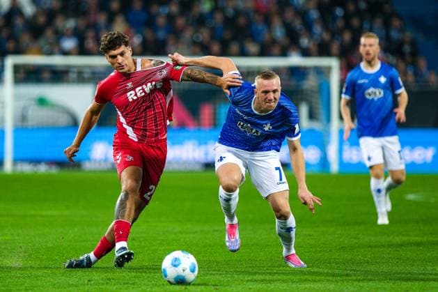 Julian Pauli 1 FC Koeln, 24 in duel with Isac Lidberg SV Darmstadt 98, 07 , GER, SV Darmstadt 98 vs 1 FC Koeln, Football, 2 Bundesliga, Matchday 9, Season 2024 2025, 18 10 2024 DFL REGULATIONS PROHIBIT ANY USE OF PHOTOGRAPHS as IMAGE SEQUENCES and or QUASI VIDEO GER, SV Darmstadt 98 vs 1 FC Koeln, Football, 2 Bundesliga, Matchday 9, Season 2024 2025, 18 10 2024 Darmsatdt Copyright: xEibner-Pressefoto FlorianxWieganx EP_FWD