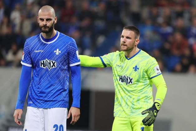 18 10 2024, xtvx, Soccer 2 Bundesliga, SV Darmstadt 98 1 FC Köln emspor, v l Aleksandar Vukotic SV Darmstadt 98 Goalkeeper Marcel Schuhen SV Darmstadt 98 Portrait DFL DFB REGULATIONS PROHIBIT ANY USE OF PHOTOGRAPHS as IMAGE SEQUENCES and or QUASI VIDEO Darmstadt