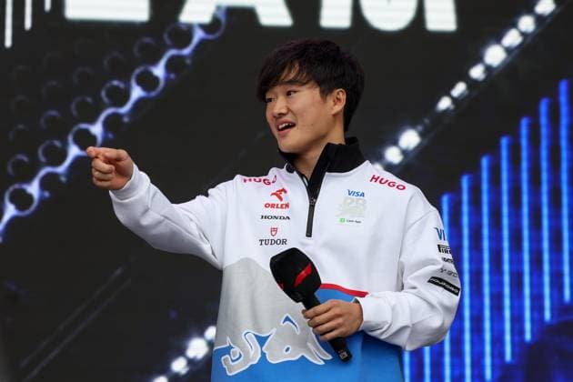 AUSTIN, TX - OCTOBER 18: Visa Cash App RB Formula One Team driver Yuki Tsunonda (22) of Japan points to fans during the Fan Forum before the first practice session of the Formula 1 Pirelli United States Grand Prix on October 18, 2024, at Circuit of The Americas in Austin, Texas. (Photo by David Buono Icon Sportswire) AUTO: OCT 18 F1 Pirelli United States Grand Prix EDITORIAL USE ONLY Icon2410180281