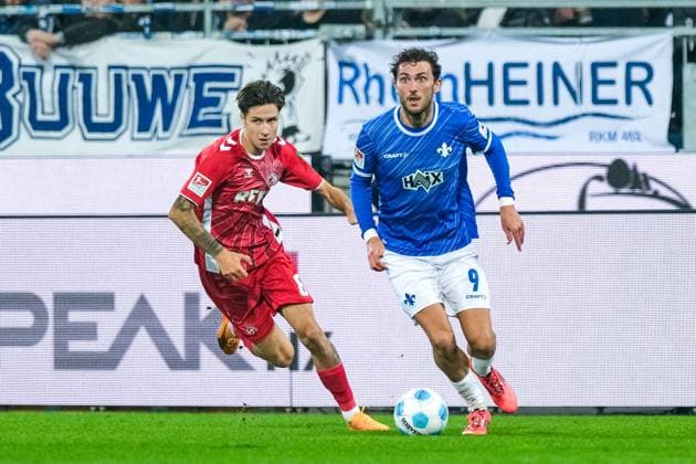 Denis Huseinbasic 1 FC Koeln, 08 in duel with Fraser Hornby SV Darmstadt 98, 09 , GER, SV Darmstadt 98 vs 1 FC Koeln, Soccer, 2 Bundesliga, Matchday 9, Season 2024 2025, 18 10 2024 DFL REGULATIONS PROHIBIT ANY USE OF PHOTOGRAPHS as IMAGE SEQUENCES and or QUASI VIDEO GER, SV Darmstadt 98 vs 1 FC Koeln, Football, 2 Bundesliga, Matchday 9, Season 2024 2025, 18 10 2024 Darmsatdt Copyright: xEibner-Pressefoto FlorianxWieganx EP_FWD