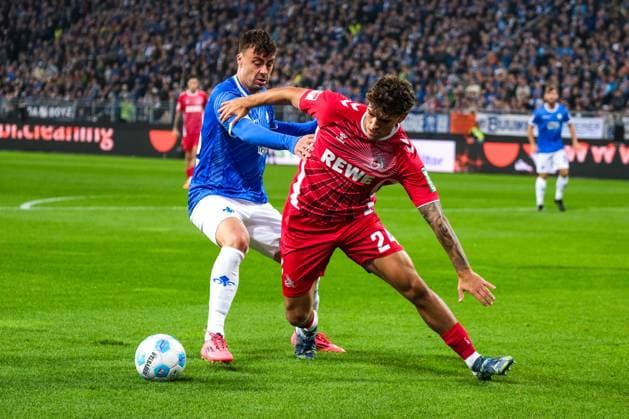 Julian Pauli 1 FC Koeln, 24 in duel with Philip Förster SV Darmstadt 98, 18 , GER, SV Darmstadt 98 vs 1 FC Koeln, Football, 2 Bundesliga, Matchday 9, Season 2024 2025, 18 10 2024 DFL REGULATIONS PROHIBIT ANY USE OF PHOTOGRAPHS as IMAGE SEQUENCES and or QUASI VIDEO GER, SV Darmstadt 98 vs 1 FC Koeln, Football, 2 Bundesliga, Matchday 9, Season 2024 2025, 18 10 2024 Darmsatdt Copyright: xEibner-Pressefoto FlorianxWieganx EP_FWD