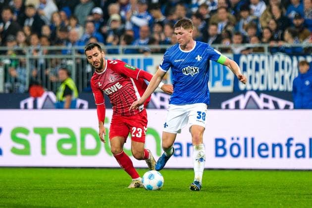 Sargis Adamyan 1 FC Koeln, 23 in duel with Clemens Riedel SV Darmstadt 98, 38 , GER, SV Darmstadt 98 vs 1 FC Koeln, Soccer, 2 Bundesliga, Matchday 9, Season 2024 2025, 18 10 2024 DFL REGULATIONS PROHIBIT ANY USE OF PHOTOGRAPHS as IMAGE SEQUENCES and or QUASI VIDEO GER, SV Darmstadt 98 vs 1 FC Koeln, Football, 2 Bundesliga, Matchday 9, Season 2024 2025, 18 10 2024 Darmsatdt Copyright: xEibner-Pressefoto FlorianxWieganx EP_FWD
