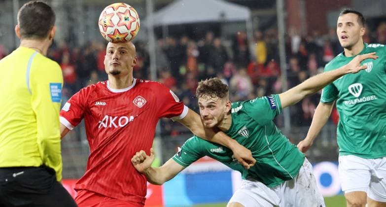 Alem Japaur left, Würzburg in duel with Luca Trslic SChweinfurt Football, Regionalliga Bayern, Season 2024 25, FC Würzburger Kickers 1 FC Schweinfurt 05 1 0 0 0 , 18 101 2024, Arkon Arena, Stadion am Dallenberg, Würzburg