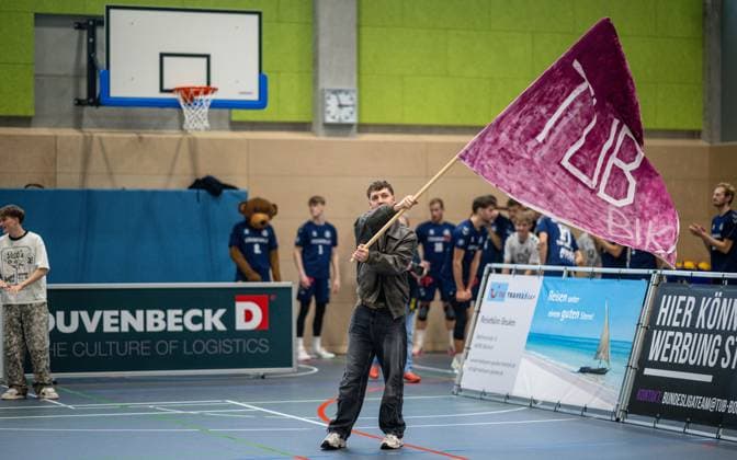 Volleyball, Season 2024 2025, 2 Bundesliga Nord, 19 10 2024, Matchday 4, Men, TuB Bocholt blue vs Kieler TV red Fan with flag Bocholt Sporthalle West Nordrhein Westfalen Germany 241019_vb_tub-bocholt_kieler-tv_33889
