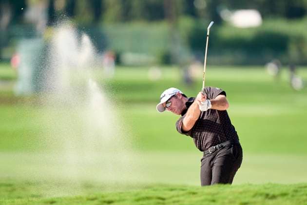 Estrella Damm N.A. Andalucia Masters 2024 Julien Guerrier of France plays his shot out of a bunker on the 18th hole on the third day of the Estrella Damm N.A. Andalucia Masters 2024 at Real Club de Golf Sotogrande in San Roque, Spain, on October 19, 2024. San Roque, Spain Spain  Copyright: xJosexManuelxAlvarezxReyx originalFilename:alvarezrey-notitle241019_npmJ7.jpg