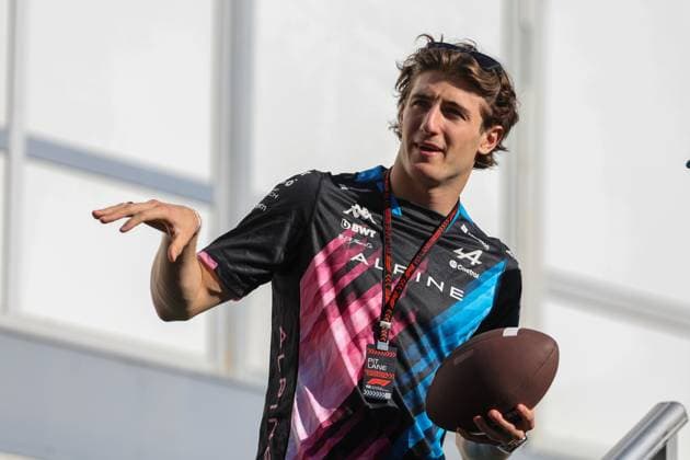 AUSTIN, TX - OCTOBER 20: BWT Alpine F1 Team driver Jack Doohan (61) of Australia with an American football in hand before the Formula 1 Pirelli United States Grand Prix on October 20, 2024, at Circuit of The Americas in Austin, Texas. (Photo by David Buono Icon Sportswire) AUTO: OCT 20 F1 Pirelli United States Grand Prix EDITORIAL USE ONLY Icon2410200281