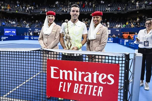 Spanish Roberto Bautista-Agut and Emirates air hostess pictured after a tennis match in the finals of the singles competition at the ATP, Tennis Herren European Open Tennis tournament in Antwerp, Sunday 20 October 2024. TOM GOYVAERTS TomxGoyvaerts  x103116716x