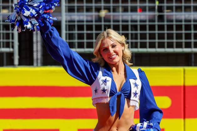 AUSTIN, TX - OCTOBER 20: A Dallas Cowboys cheerleader on the track during the drivers™ parade before the Formula 1 Pirelli United States Grand Prix on October 20, 2024, at Circuit of The Americas in Austin, Texas. (Photo by David Buono Icon Sportswire) AUTO: OCT 20 F1 Pirelli United States Grand Prix EDITORIAL USE ONLY Icon2410200521