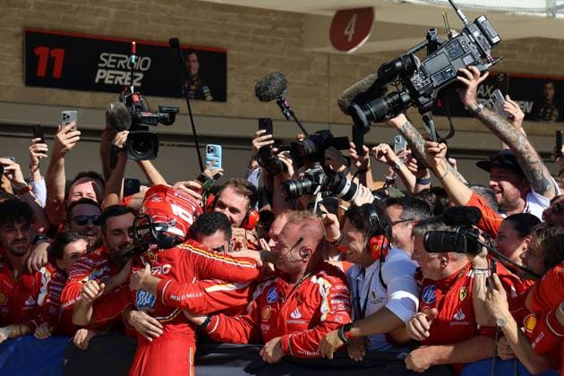 Charles Leckerc MON winner with helmet is frenetically celebrated by the Ferrari team members, Parc ferme, Formula 1 Pirelli Grand Prix, FIA F1 World Championship, Circuit of America, Austin Texas, 20 10 2024, USA, track and field athlete