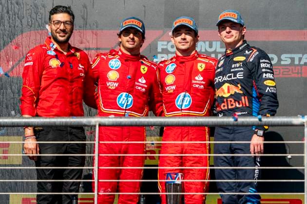 Spanish Formula One driver Carlos Sainz Jr. of Scuderia Ferrari, Monaco s Formula One driver Charles Leclerc of Scuderia Ferrari and Dutch Formula One driver Max Verstappen of Red Bull Racing pose for a photo on the podium following the Formula One United States Grand Prix at the Circuit of the Americas in Austin, Texas on Sunday, October 20, 2024.  AUS2024102064 GREGxNASH