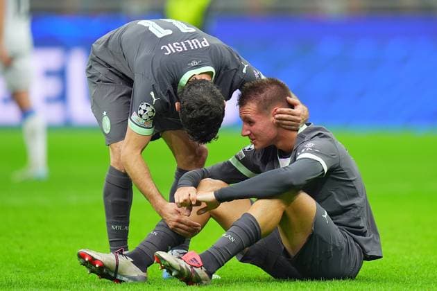 Ac Milan s Francesco Camarda, AC Milan s Christian Pulisic at the end of the Uefa Champions League soccer match between Ac Milan and Club Brugge a at the San Siro Stadium in Milan, north Italy -Tuesday , October 22 , 2024. - Soccer .  Copyright: xSpada LaPressex