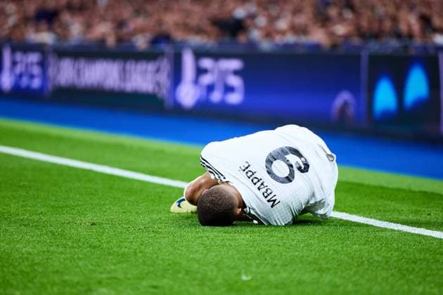 Kylian Mbappe of Real Madrid CF lies injured during the UEFA Champions League match between Real Madrid vs Borussia Dortmund at Santiago Bernabeu on October 22, 2024 in Madrid (Photo by: LGM) FOOTBALL : Real Madrid vs Borussia Dortmund - UEFA Ligue des Champions - 22 10 2024 LGM Panoramic 