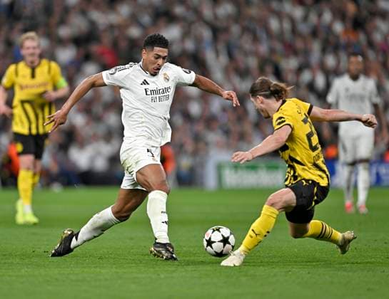 22 10 2024, Football UEFA Champions League 2024 2025, Matchday 3, Real Madrid Borussia Dortmund, at Estadio Santiango Bernabeu in Madrid Spain , Jude Bellingham Real Madrid vs Marcel Sabitzer Borussia Dortmund DFL and DFB regulations prohibit any use of photographs as image sequences and or quasi video