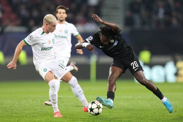SOCCER - UEFA CL, Sturm vs Sporting KLAGENFURT,AUSTRIA,22.OCT.24 - SOCCER - UEFA Champions League, SK Sturm Graz vs Sporting CP. Image shows Nuno Santos (Sporting Lissabon) and Seedy Jatta (Sturm).  GEPAxpictures xChrisxBauer