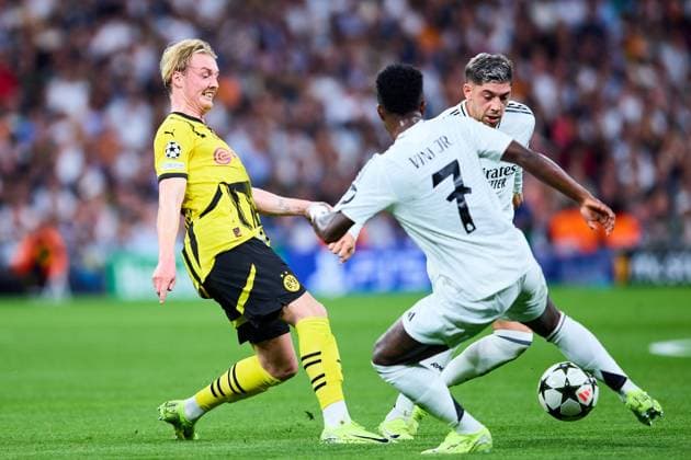 Federico Valverde of Real Madrid CF battles for the ball with Julian Brandt of Borussia Dortmund during the UEFA Champions League match between Real Madrid vs Borussia Dortmund at Santiago Bernabeu on October 22, 2024 in Madrid (Photo by: LGM) FOOTBALL : Real Madrid vs Borussia Dortmund - UEFA Ligue des Champions - 22 10 2024 LGM Panoramic 