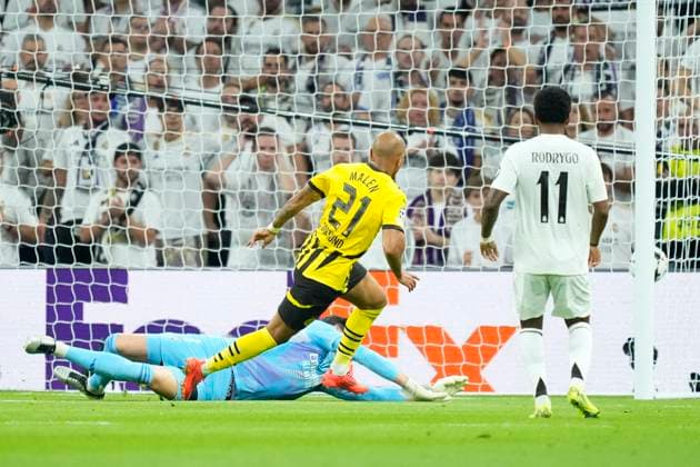 Real Madrid C.F. v Borussia Dortmund - UEFA Champions League 2024 25 League Phase MD3 Donyell Malen right winger of Borussia Dortmund and Netherlands shooting to goal during the UEFA Champions League 2024 25 League Phase MD3 match between Real Madrid C.F. and Borussia Dortmund at Estadio Santiago Bernabeu on October 22, 2024 in Madrid, Spain. Madrid Spain  Copyright: xJosexBretonx originalFilename:bretonhernandez-realmadr241022_npBEs.jpg