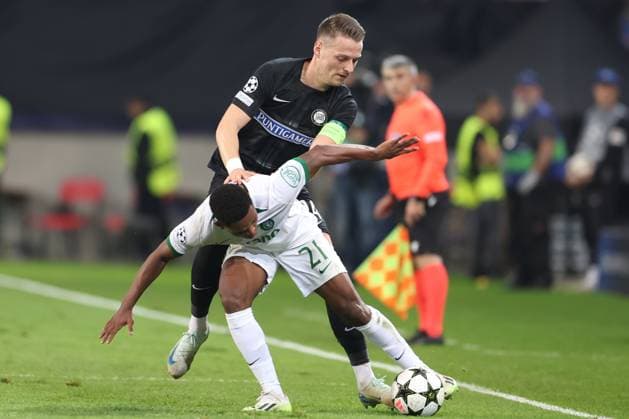 SOCCER - UEFA CL, Sturm vs Sporting KLAGENFURT,AUSTRIA,22.OCT.24 - SOCCER - UEFA Champions League, SK Sturm Graz vs Sporting CP. Image shows Dimitri Lavalee (Sturm) and Geny Catamo (Sporting Lissabon).  GEPAxpictures xChrisxBauer
