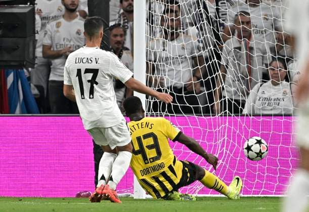 22 10 2024, Football UEFA Champions League 2024 2025, Matchday 3, Real Madrid Borussia Dortmund, at Estadio Santiango Bernabeu in Madrid Spain , Jamie Bynoe Gittens Dortmund scores to 0 2 Lucas Vazquez Real Madrid DFL and DFB regulations prohibit any use of photographs as image sequences and or quasi video