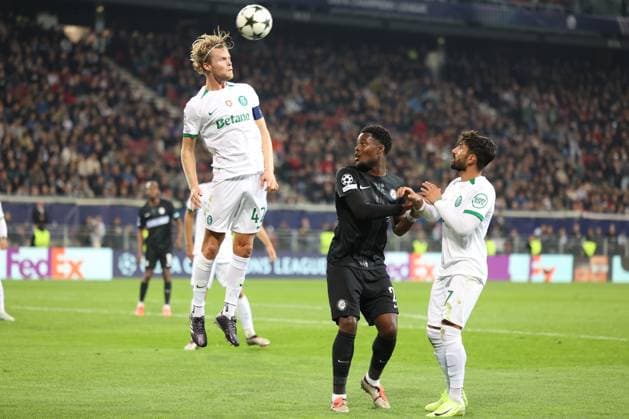 SOCCER - UEFA CL, Sturm vs Sporting KLAGENFURT,AUSTRIA,22.OCT.24 - SOCCER - UEFA Champions League, SK Sturm Graz vs Sporting CP. Image shows Morten Hjulmand (Sporting Lissabon), Tochi Chukwuani (Sturm) and Trincao (Sporting Lissabon).  GEPAxpictures xChrisxBauer