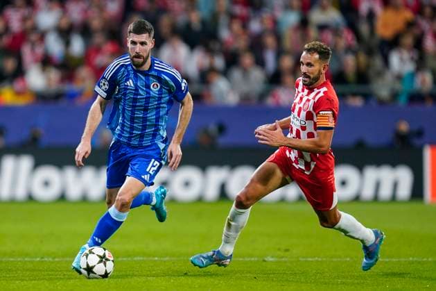 ESP: Girona FC v SK Slovan Bratislava. UEFA Champions League match. Date 3 Kenan Bajric of Slovan Bratislava and Cristhian Stuani of Girona FC during the UEFA Champions League match, date 3 between Girona FC and SK Slovan Bratislava played at Montilivi Stadium on October 22, 2024 in Girona, Spain. kpng Copyright: xSergioxRuizx xImagox PS_241022_GIR_SLO_024