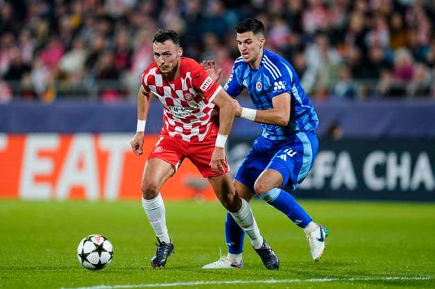 ESP: Girona FC v SK Slovan Bratislava. UEFA Champions League match. Date 3 Arnau Martinez of Girona FC and Marko Tolic of Slovan Bratislava during the UEFA Champions League match, date 3 between Girona FC and SK Slovan Bratislava played at Montilivi Stadium on October 22, 2024 in Girona, Spain. kpng Copyright: xSergioxRuizx xImagox PS_241022_GIR_SLO_016