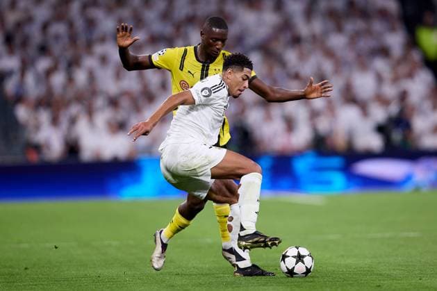 Jude Bellingham of Real Madrid CF and Serhou Guirassy of Borussia Dortmund Real Madrid v Borusssia Dortmund, La Liga, Football, Santiago Bernabeu Stadium, Madrid, Spain - 22 Oct 2024  Copyright: xRubenxAlbarran Shutterstockx 14805565ay