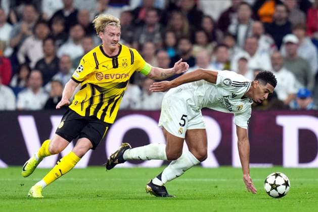 Julian Brandt of Borussia Dortmund and Jude Bellingham of Real Madrid CF Real Madrid v Borussia Dortmund, UEFA Champios League match, date 3. Football, Santiago Bernabeu Stadium, Madrid, Spain - 22 Oct 2024 Editorial use only  Copyright: xPressinphoto Shutterstockx 14806059f