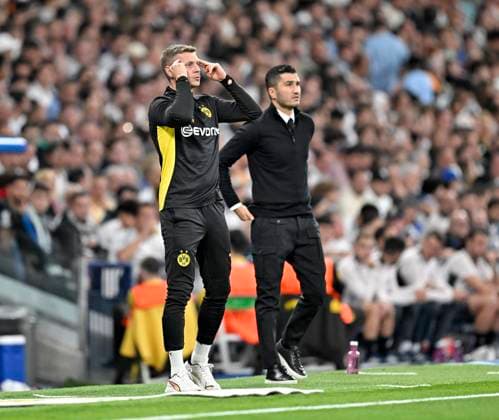 22 10 2024, Football UEFA Champions League 2024 2025, Matchday 3, Real Madrid Borussia Dortmund, at Estadio Santiango Bernabeu in Madrid Spain , f l Co coach Lukasz Piszczek and coach Nuri Sahin both, Borussia Dortmund already a well-rehearsed team DFL and DFB regulations prohibit any use of photographs as image sequences and or quasi video