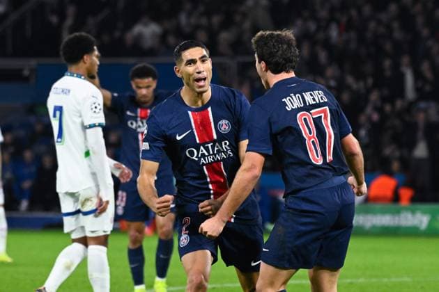 Achraf Hakimi ( 2 - PSG ) celebrates with Joao Pedro Goncalves Neves ( 87 - PSG ) during the UEFA Champions League match between Paris Saint Germain and PSV Eindhoven at Parc Des Princes on October 22, 2024 in Paris, France. ( Photo by federico pestellini panoramic ) - FOOTBALL : PSG vs PSV - Ligue des Champions - 22 10 2024 FedericoPestellini Panoramic 