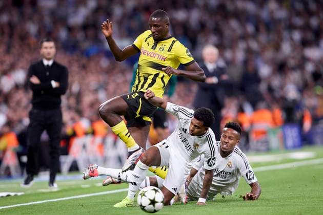 October 22, 2024, Madrid, Madrid, Spain: Serhou Guirassy of Borussia Dortmund and Rodrygo Goes of Real Madrid CF during the UEFA Champions League football match between Real Madrid CF and Borussia Dortmund at Santiago Bernabeu Stadium in Madrid, Spain, October 22, 2024 Madrid Spain - ZUMAa206 20241022_zsp_a206_033 Copyright: xRubenxAlbarranx